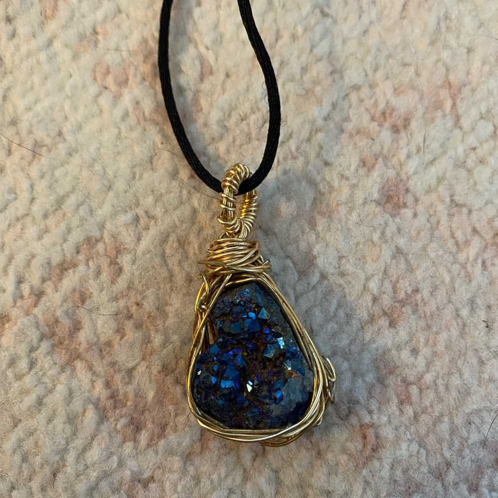 Gold wire wrapped blue crystal necklace
